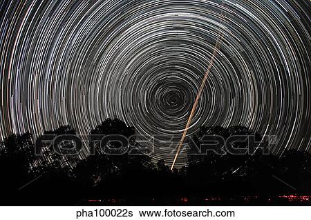 Southern Sky star trails and aircraft lights. View Large Photo Image Stock Photograph - Southern Sky star trails and aircraft lights.. Fotosearch