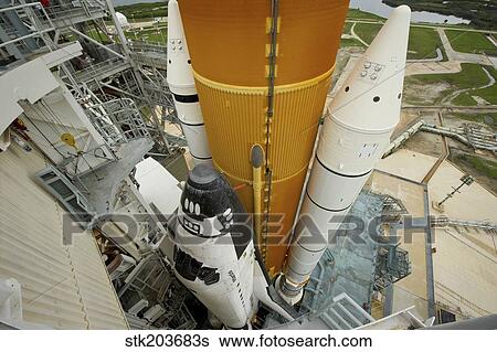 Space shuttle Atlantis on the launch pad at Kennedy Space Center, Florida. View Large Photo Image Stock Photograph - Space shuttle Atlantis on the launch pad at Kennedy Space Center, Florida.. Fotosearch