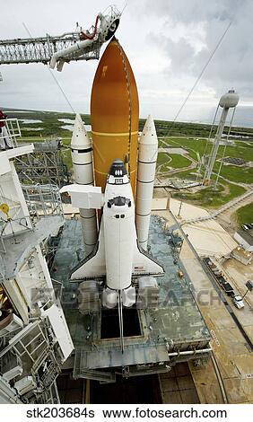 Space shuttle Atlantis on the launch pad at Kennedy Space Center, Florida. View Large Photo Image Stock Photograph - Space shuttle Atlantis on the launch pad at Kennedy Space Center, Florida.. Fotosearch