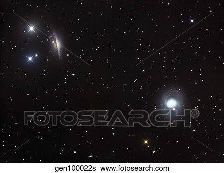 Spiral galaxies NGC 1068 and NGC 1055 located in the constellation Cetus. View Large Photo Image Stock Photograph - Spiral galaxies NGC 1068 and NGC 1055 located in the constellation Cetus.. Fotosearch