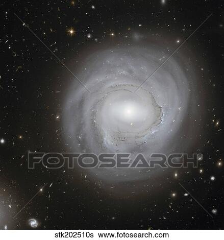 Spiral Galaxy NGC 4921 View Large Photo Image Stock Photograph - Spiral Galaxy NGC 4921. Fotosearch