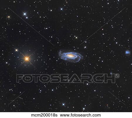Spiral galaxy NGC 5033 in the constellation Canes Venatici. View Large Photo Image Stock Photograph - Spiral galaxy NGC 5033 in the constellation Canes Venatici.. Fotosearch
