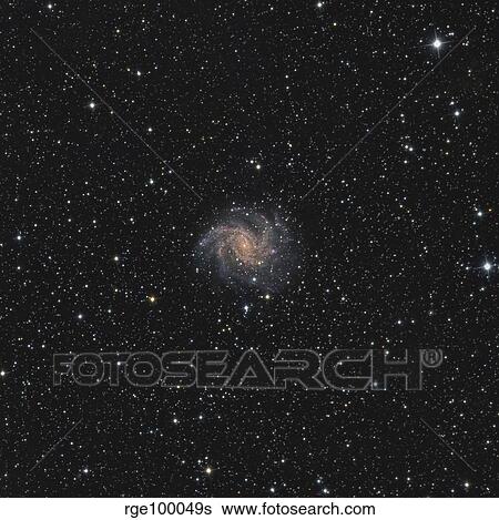Stock Photograph - Spiral galaxy NGC 6946. Fotosearch