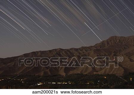 Star trails above a valley in the Firoozkooh area, Iran. View Large Photo Image Stock Photograph - Star trails above a valley in the Firoozkooh area, Iran.. Fotosearch