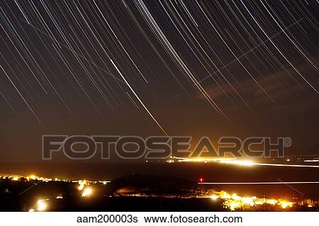 Star trails above a village in the central desert of Iran. View Large Photo Image Stock Photograph - Star trails above a village in the central desert of Iran.. Fotosearch