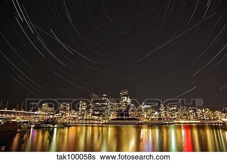 Star trails above Downtown Vancouver, British Columbia, Canada. View Large Photo Image Stock Photograph - Star trails above Downtown Vancouver, British Columbia, Canada.. Fotosearch