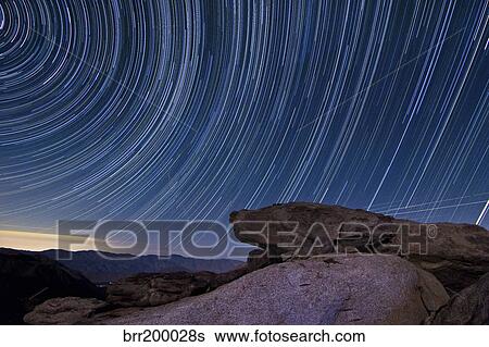 Star trails and a granite rock outcropping overlooking Anza Borrego Desert State Park. View Large Photo Image Stock Photograph - Star trails and a granite rock outcropping overlooking Anza Borrego Desert State Park.. Fotosearch