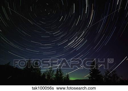 Star Trails and Low Altitude Aurora, Lumby, British Columbia, Canada. View Large Photo Image Stock Photograph - Star Trails and Low Altitude Aurora, Lumby, British Columbia, Canada.. Fotosearch