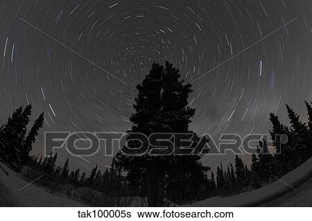 Star trails and Milky Way. View Large Photo Image Stock Photograph - Star trails and Milky Way.. Fotosearch