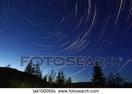 Star trails at dusk. View Large Photo Image Stock Photograph - Star trails at dusk.. Fotosearch