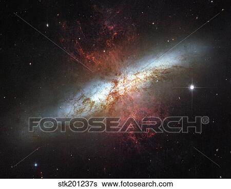 Starburst galaxy, Messier 82 View Large Photo Image Stock Photograph - Starburst galaxy, Messier 82. Fotosearch