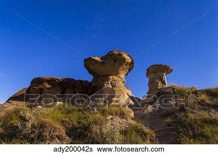 Starry sky above hoodoo formations at Dinosaur Provincial Park, Canada. View Large Photo Image Stock Photograph - Starry sky above hoodoo formations at Dinosaur Provincial Park, Canada.. Fotosearch