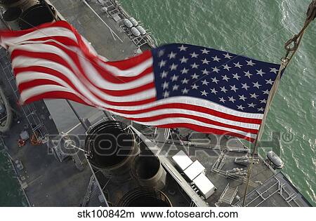 Stars & Stripes flying boldly as seen from the crow's nest aboard USS Donald Cook. View Large Photo Image Picture - Stars & Stripes flying boldly as seen from the crow's nest aboard USS Donald Cook.. Fotosearch