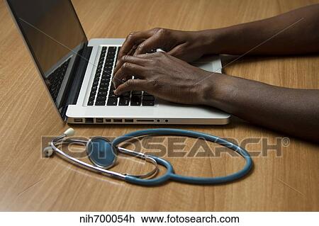 Stethoscope and laptop computer. View Large Photo Image Stock Image - Stethoscope and laptop computer.. Fotosearch