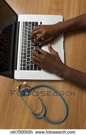 Stethoscope and laptop computer. View Large Photo Image Stock Image - Stethoscope and laptop computer.. Fotosearch