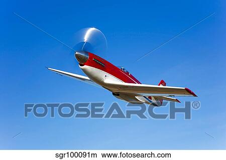 Strega, a highly modified P-51D Mustang used in unlimited air racing. View Large Photo Image Picture - Strega, a highly modified P-51D Mustang used in unlimited air racing. . Fotosearch