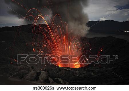 Stock Photograph - Strombolian eruption of Mount Bromo volcano, Tengger Caldera, Java, Indonesia.. Fotosearch