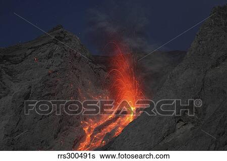 Stock Photograph - Strombolian type eruption of Batu Tara volcano, Indonesia.. Fotosearch