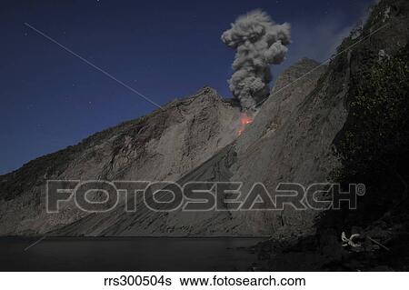 Stock Photograph - Strombolian type eruption of Batu Tara volcano, Indonesia.. Fotosearch