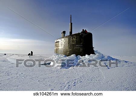 Submarine USS Connecticut surfaces above the ice. View Large Photo Image Picture - Submarine USS Connecticut surfaces above the ice.. Fotosearch