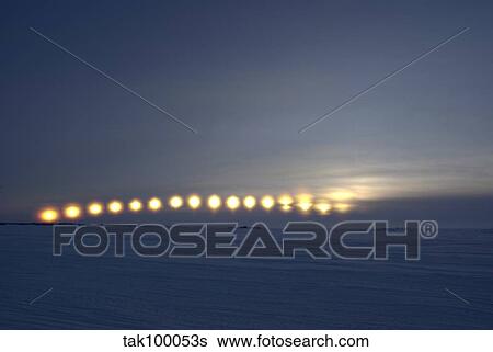 Sun movement from Dettah Ice Road, Yellowknife, Northwest Territories, Canada. View Large Photo Image Stock Photograph - Sun movement from Dettah Ice Road, Yellowknife, Northwest Territories, Canada.. Fotosearch