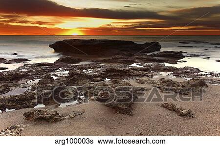 Sunrise over the seascape of Miramar, Argentina. View Large Photo Image Stock Photograph - Sunrise over the seascape of Miramar, Argentina.. Fotosearch