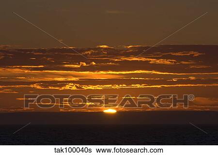 Sunset at Gulf of St. Lawrence. View Large Photo Image Stock Photograph - Sunset at Gulf of St. Lawrence.. Fotosearch