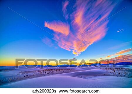 Sunset colors over White Sands National Monument, New Mexico. View Large Photo Image Stock Photograph - Sunset colors over White Sands National Monument, New Mexico.. Fotosearch