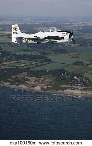 T-28 Trojan trainer warbird in U. S. Navy colors. View Large Photo Image Picture - T-28 Trojan trainer warbird in U. S. Navy colors.. Fotosearch