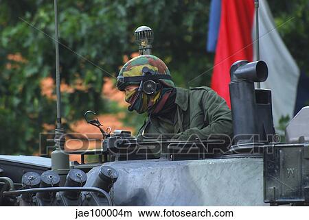 Tank commander of a Leopard 1A5 MBT of the Belgian Army. View Large Photo Image Picture - Tank commander of a Leopard 1A5 MBT of the Belgian Army.. Fotosearch