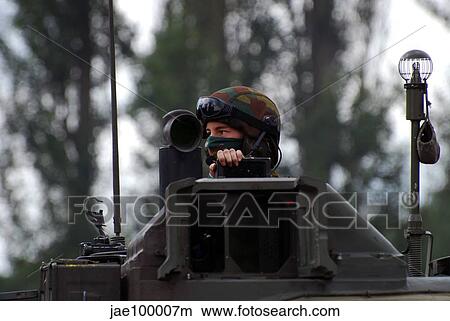 Tank commander of a Leopard 1A5 MBT of the Belgian Army. View Large Photo Image Picture - Tank commander of a Leopard 1A5 MBT of the Belgian Army.. Fotosearch
