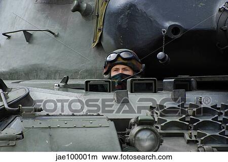 Tank driver of a Leopard 1A5 MBT of the Belgian Army. View Large Photo Image Picture - Tank driver of a Leopard 1A5 MBT of the Belgian Army.. Fotosearch