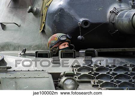 Tank driver of a Leopard 1A5 MBT of the Belgian Army. View Large Photo Image Picture - Tank driver of a Leopard 1A5 MBT of the Belgian Army.. Fotosearch