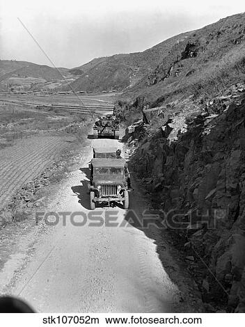 Tank-led patrol of Leathernecks hunt down North Korean guerrillas. View Large Photo Image Picture - Tank-led patrol of Leathernecks hunt down North Korean guerrillas.. Fotosearch