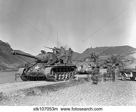 Tank-led patrol of Leathernecks hunt down North Korean guerrillas. View Large Photo Image Picture - Tank-led patrol of Leathernecks hunt down North Korean guerrillas.. Fotosearch