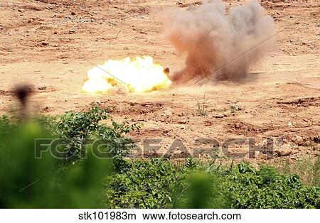 Ten half-pound blocks of TNT simultaneously detonate. View Large Photo Image Picture - Ten half-pound blocks of TNT simultaneously detonate.. Fotosearch