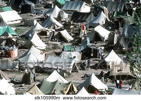 Tents cover the mountainside in the Kurdish refugee camp of Yekmel. View Large Photo Image Picture - Tents cover the mountainside in the Kurdish refugee camp of Yekmel.. Fotosearch