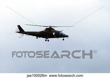 The Agusta A-109 helicopter of the Belgian Army in flight. View Large Photo Image Picture - The Agusta A-109 helicopter of the Belgian Army in flight.. Fotosearch