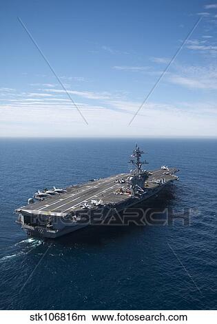 The aircraft carrier USS Carl Vinson in the Pacific Ocean. View Large Photo Image Picture - The aircraft carrier USS Carl Vinson in the Pacific Ocean.. Fotosearch