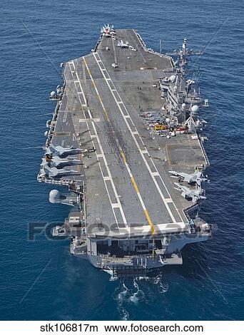 The aircraft carrier USS Carl Vinson in the Pacific Ocean. View Large Photo Image Picture - The aircraft carrier USS Carl Vinson in the Pacific Ocean.. Fotosearch