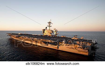 The aircraft carrier USS Carl Vinson is underway in the Pacific Ocean. View Large Photo Image Picture - The aircraft carrier USS Carl Vinson is underway in the Pacific Ocean.. Fotosearch