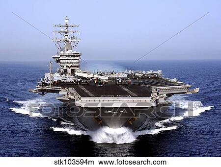 The aircraft carrier USS Dwight D. Eisenhower transits the Arabian Sea. View Large Photo Image Picture - The aircraft carrier USS Dwight D. Eisenhower transits the Arabian Sea.. Fotosearch