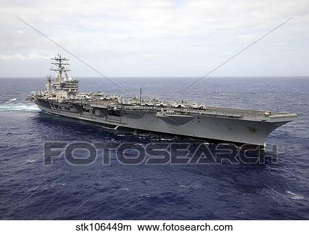 The aircraft carrier USS Nimitz transits the Pacific Ocean. View Large Photo Image Picture - The aircraft carrier USS Nimitz transits the Pacific Ocean.. Fotosearch