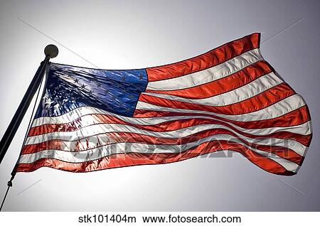 The American flag flies prominently. View Large Photo Image Picture - The American flag flies prominently.. Fotosearch