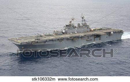 The amphibious assault ship USS Essex transits the Pacific Ocean. View Large Photo Image Picture - The amphibious assault ship USS Essex transits the Pacific Ocean.. Fotosearch
