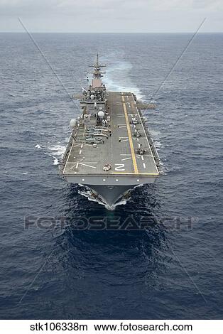 The amphibious assault ship USS Essex transits the Pacific Ocean. View Large Photo Image Picture - The amphibious assault ship USS Essex transits the Pacific Ocean.. Fotosearch