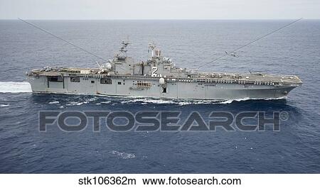 Picture - The amphibious assault ship USS Essex transits the Pacific Ocean.. Fotosearch