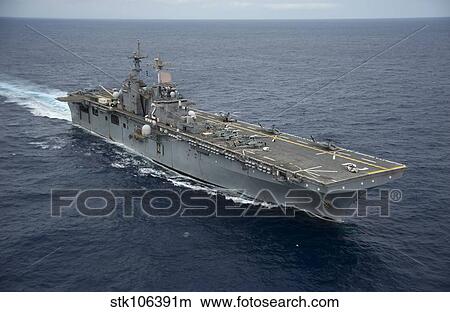 Picture - The amphibious assault ship USS Essex transits the Pacific Ocean.. Fotosearch