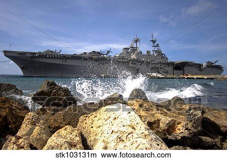 The amphibious assault ship USS Kearsarge visiting the Netherlands Antilles for the humanitarian service project. View Large Photo Image Picture - The amphibious assault ship USS Kearsarge visiting the Netherlands Antilles for the humanitarian service project.. Fotosearch