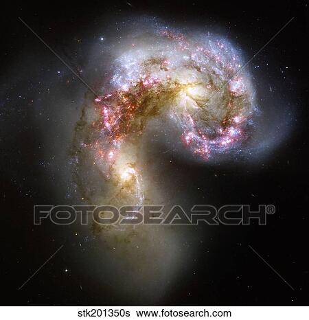 The Antennae galaxies. View Large Photo Image Stock Photograph - The Antennae galaxies.. Fotosearch